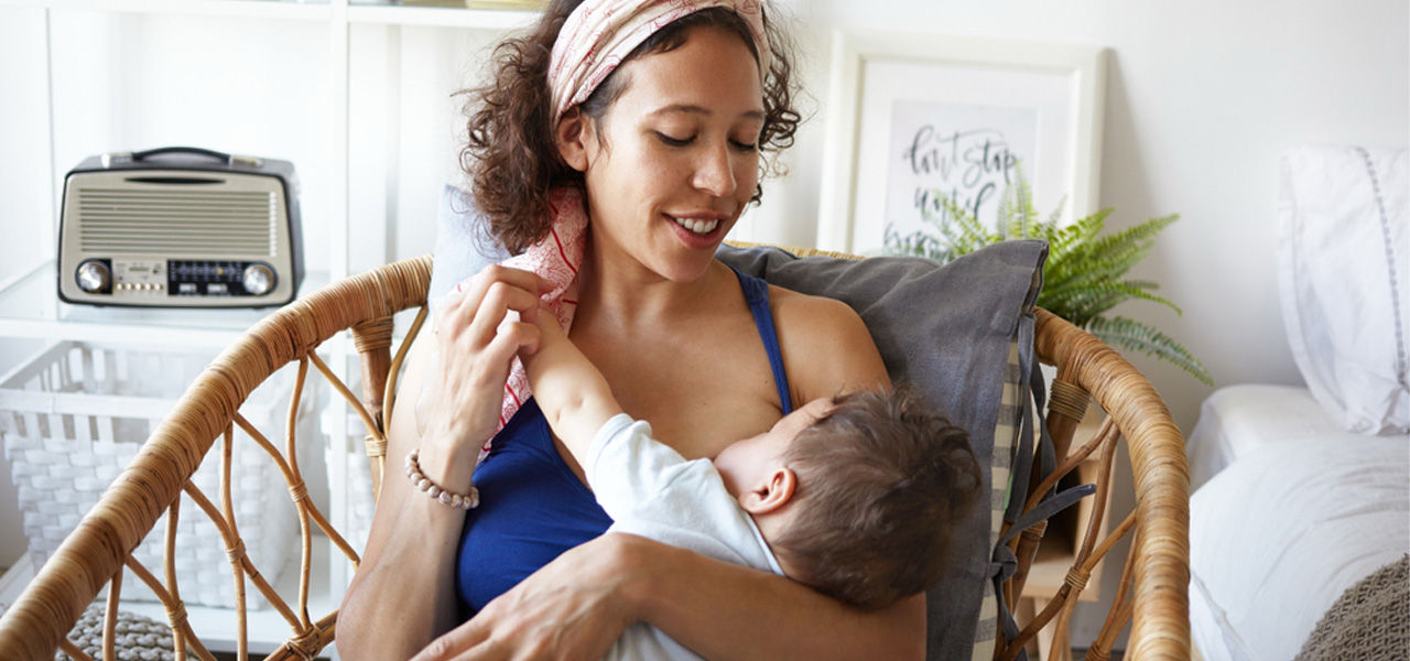 mother breastfeeding her infant